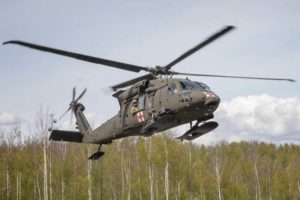 An HH-60M Black Hawk MEDEVAC helicopter from 1st Battalion, 207th Aviation Regiment, Alaska Army National Guard, lands at the Mat-Su Fire Training Site in Wasilla. (U.S. Army National Guard photo by Edward Eagerton)