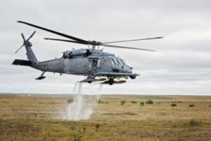JOINT BASE ELMENDORF-RICHARDSON, Alaska - An HH-60 Pave Hawk helicopter from the 210th Rescue Squadron takes off from the tundra. (U.S. Air National Guard photo by Staff Sgt. Edward Eagerton/released)