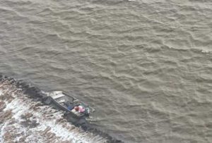 An 18-foot flat bottom vessel is shown drifting on Selawik Lake, Oct. 5, 2021. Three teenagers were rescued after becoming stranded on land without their vessel while on a hunting trip together. U.S. Coast Guard photo.