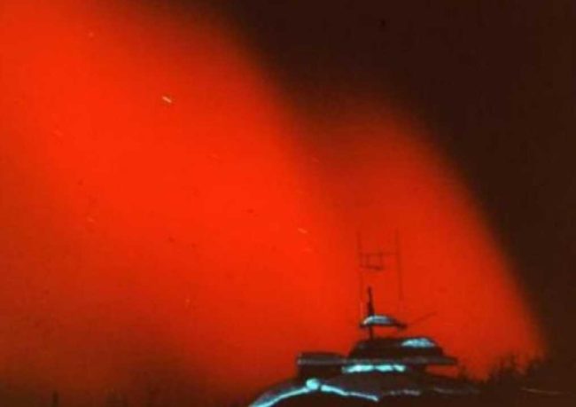 A rare red aurora over Alaska in February 1958. Image-Geophysical Institute