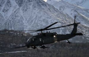 An Alaska Air National Guard HH-60 Pave Hawk, from the 210th Rescue Squadron, is on a training flight near Joint Base Elmendorf-Richardson in February 2013. (U.S. Air Guard photo by Capt. Bernie Kale)
