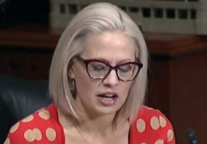 Sen. Kyrsten Sinema on Senate floor. Youtube video screengrab.