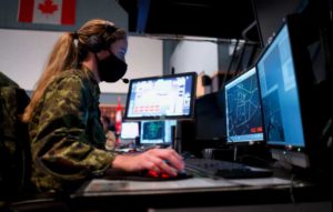 Royal Canadian Air Force Capt. Elyse O’Brien, 176th Air Defense Squadron air battle manager, monitors her radar-display scope. (U.S. Air National Guard photo by David Bedard/Released)