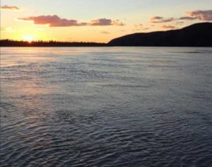 The Yukon River flows toward Circle, Alaska. Two thirds of the flowing water in Alaska makes its way into the Yukon. Photo-Ned Rozell