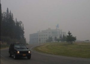 The Akasofu Building on the University of Alaska-Fairbanks campus is bathed in smoke during the dramatic summer of 2004. Image-Ned Rozell