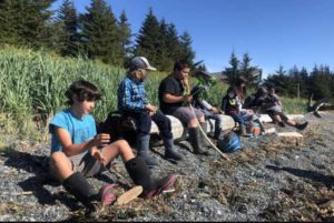 Students getting ready to collect seaweed to bring back to the classroom. Credit: NOAA Fisheries