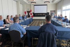 Canadian Coast Guard, U.S. Coast Guard, and civilian personnel participating at a Canada-U.S. Arctic multi-mission meeting at the Explorer Hotel in Yellowknife, Northwest Territories, Canada, June 7, 2022. Photo by Petty Officer 3rd Class Alexandria Preston