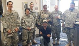 Members of the Alaska State Defense Force assist the Red Cross and Yukon-Kuskokwim Health Corporation in providing essential services to approximately 50 people in the Alaska National Guard armory in Bethel, Alaska, June 18. People from Mt. Village, Pilot Station, Pitkas Point and St. Mary's were relocated to the armory in Bethel as a precaution against wildfires and potential smoke inhalation. (Alaska National Guard Courtesy Photo)