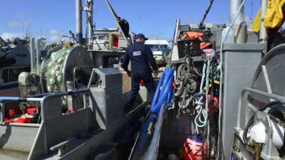 Petty Officer 3rd Class Joshua Smith, a marine inspector from Coast Guard Sector Anchorage’s Marine Safety Task Force (MSTF), conducts a dockside commercial fishing vessel safety exam in Naknek. U. S. Coast Guard photo by Petty Officer 2nd Class Melissa E. F. McKenzie. Coast Guard inspectors return from Bristol Bay in support of salmon season opening