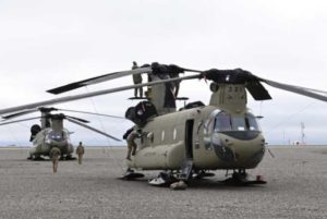 Flight crews prepare two CH-47 Chinook helicopters for flight at the Deadhorse, Alaska, airport. (Army photo/John Pennell)