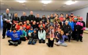 Members from Coast Guard Cutter Stratton visit Kaktovik, Alaska, Oct. 1, 2022, and participate in a question-and-answer session with approximately 45 community members, including roughly 30 children.  (U.S. Coast Guard photo courtesy of Coast Guard Cutter Stratton)