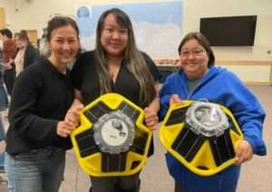 Photo: Alaska Eskimo Whaling Commission staff hold Sofar buoys at a co-production workshop. Credit: James Kendall/Bureau of Ocean Energy Management.