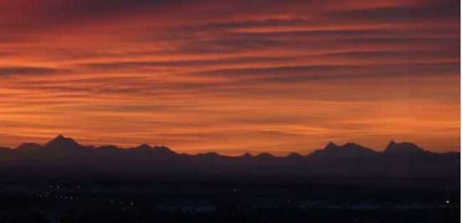 The Alaska Range sits beneath a December sunrise as seen from the UAF campus. Photo by Ned Rozell