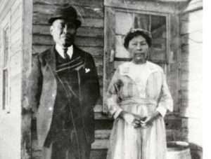 Photo: Akhiok husband and wife, ca. 1930. Courtesy of the National Archive, Seattle.