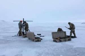 Alaska Air Guardsmen with the 168th Wing
Communications Flight assemble a portable UHF
radio mast extending communications to radio
systems outside the local area. Image-Alaska  National Guard