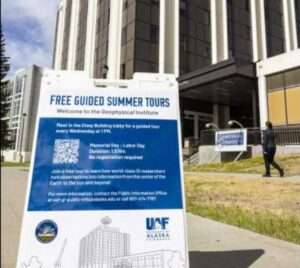 A sign welcomes visitors for free guided summer tours of the Geophysical Institute, which start at the Elvey Building on UAF's West Ridge. UAF/Geophysical Institute photo by JR Ancheta
