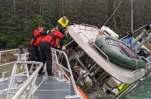 A 45-foot Response Boat-Medium crew from Coast Guard Station Juneau safely evacuates a man in the Gastineau Channel, near Juneau, Alaska, Aug. 1, 2023. The man was safely transported in stable condition to Harris Harbor. Coast Guard courtesy photo.
