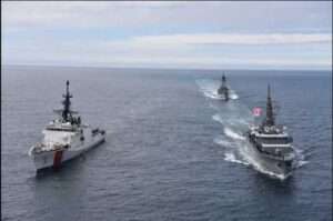 U.S. Coast Guard Cutter Bertholf (WMSL 750) sails alongside Japanese Military Self Defense Force Training Ships HATAKAZE and KASHIMA in the Bering Sea, June 3, 2023. (U.S. Coast Guard photo by Lt. Cmdr. Scott McCann)