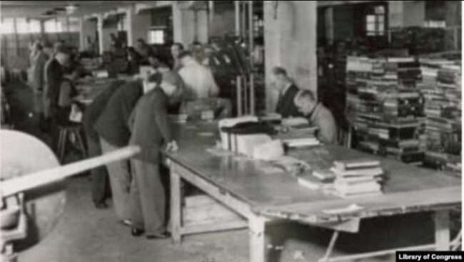 The Offenbach Archival Depot, where books, manuscripts and archival materials taken by the Nazis during World War II were sorted and returned to their country of origin or maintained in new collections, 1946.
