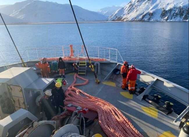 Response personnel stage the Emergency Towing System aboard M/V Genius Star XI while offshore Unalaska, Alaska, Dec. 31, 2023. The M/V Genius Star XI remains stable. Assessment teams on site report air quality remains normal, and there is no indication of heat in or around the cargo holds. Courtesy photo.
