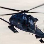 An Alaska Air National Guard HH-60W Jolly Green II helicopter, assigned to the 210th Rescue Squadron, 176th Wing, returns to Joint Base Elmendorf-Richardson, Alaska, after conducting a rescue mission for an injured snowmachiner, Feb. 21, 2026. The mission marked the time the AKANG used the HH-60W for a rescue. (U.S. Air National Guard photo by Staff Sgt. Joseph Moon)