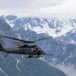 An Alaska Air National Guard HH-60W Jolly Green II, assigned to the 210th Rescue Squadron, 176th Wing, flies over Southcentral Alaska. (Alaska National Guard photo by Alejandro Peña)