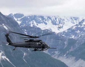An Alaska Air National Guard HH-60W Jolly Green II, assigned to the 210th Rescue Squadron, 176th Wing, flies over Southcentral Alaska. (Alaska National Guard photo by Alejandro Peña)
