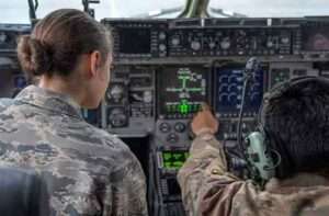 Air Force Junior Reserve Officers’ Training Corps cadet Aryanna Sparks, a student at West Anchorage High School, learns about the systems of a C-17 Globemaster III assigned to the 176th Wing and 3rd Wing from Senior Airman Maximilian Visaya. (U.S. Air Force photo by Airman 1st Class J. Michael Peña)