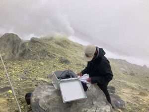 Outgassing on Mt. Griggs, a stratovolcano in Katmai National Park. The yellow color in the rocks is from high sulfuric content (Photo courtsey Paul Gabriel)