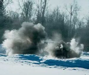 Explosions occur after Navy technicians, assigned to Explosive Ordnance Disposal Mobile Unit 11, and Air Force EOD technicians, assigned to the 673rd Expeditionary Civil Engineer Squadron, laid C4. Credit: Navy Petty Officer 2nd Class August Clawson