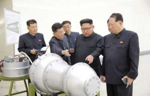 North Korean leader Kim Jong Un, center, provides guidance on a nuclear weapons program in this undated photo released by North Korea's Korean Central News Agency (KCNA)