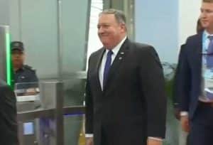 U.S. Secretary of State Mike Pompeo walking through airport upon his arrival in China for trade talks. Image-Reuters video screenshot