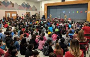 Guardsmen with the Alaska National Guard Counterdrug Support Program help kick-off Red Ribbon Week in Anchorage with a drug free celebration at Muldoon Elementary School, October 29, 2018. (U.S. Army National Guard photo by Staff Sgt. Balinda O’Neal Dresel)