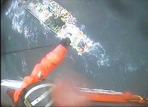 USCG Jayhawk hoist a surviving crew,member from Good Samaritan vessel. Image-USCG