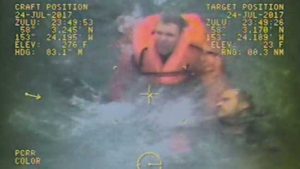 Rescue of crewmember after the capsize of the F/V Grayling. Image-Screengrab USCG video