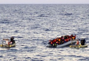Italian Navy personnel contacting migrants 40 miles off the coast of Libya. Image-Italian Navy