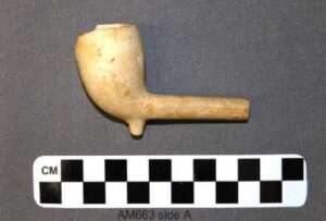 Photo: McDougall / Glasgow koalin clay pipe, late 19th century, made in Pennsylvania. Alutiiq Museum collections.
