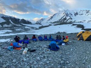 Photo by Bri Rick
2023 Girls* On Ice participants sit in a sleeping bag circle at their camp on the Gulkana Glacier.