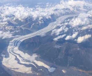 Image courtesy of the Alaska Volcano Observatory/Alaska Division of Geological and Geophysical Surveys The Klutlan Glacier flows into Canada's Yukon from Alaska’s Mount Bona, the highest peak in the photo, and Mount Churchill, the high ridge to the right of Bona.