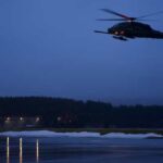 COAST GUARD AIR STATION KODIAK, Alaska -- Carrying U.S. Coast Guardsmen of the Maritime Security Response Team, a 210th Rescue Squadron HH-60G Pave Hawk combat search and rescue helicopter conducts joint hoist training Jan. 9, 2023, at Coast Guard Station Kodiak. The Interagency training included participation of U.S. Naval Special Warfare, the Coast Guard's Maritime Security Response Team, and the Alaska Air National Guard's 210th Rescue Squadron. (Alaska Air National Guard photo by David Bedard)