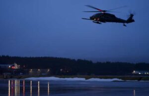 COAST GUARD AIR STATION KODIAK, Alaska -- Carrying U.S. Coast Guardsmen of the Maritime Security Response Team, a 210th Rescue Squadron HH-60G Pave Hawk combat search and rescue helicopter conducts joint hoist training Jan. 9, 2023, at Coast Guard Station Kodiak. The Interagency training included participation of U.S. Naval Special Warfare, the Coast Guard's Maritime Security Response Team, and the Alaska Air National Guard's 210th Rescue Squadron. (Alaska Air National Guard photo by David Bedard)
