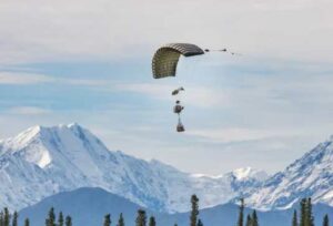 A parachute bundle descends during an experimental drop as a part of Arctic Edge 25 near Tok
