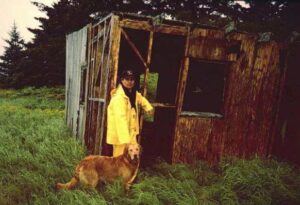 Photo: Rick Rowland and his dog Shaman, Afognak Village, 1997, AM628