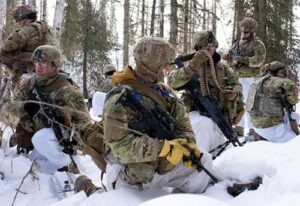 Soldiers of Weapons Squad, 1st and 2nd Platoon, Avalanche Company, 1st Battalion, 297th Infantry Regiment, prepare to emplace a support-by-fire position March 21, 2026. (Alaska National Guard photo by Maj. David Bedard)