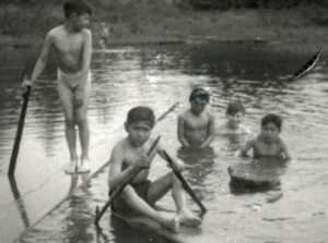 Photo: Boys swimming near Ouzinkie, ca. 1940. Smith Collection, courtesy of Tim and Norman Smith.
