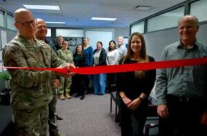 The Alaska National Guard Adjutant General Maj. Gen. Torrence Saxe ceremonially opens the AKNG Human Resource Office for business. (Alaska National Guard photo by David Bedard)