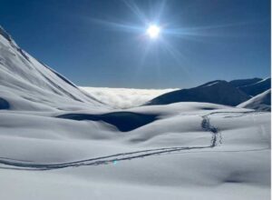 Photo by Julia White
Learn about the physics of snow, including how drifts form and what allows people to walk on them — or ski on them, as in this photo from Hatcher Pass.