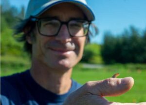 Photo by Stephen Nowers
Joey Slowik, an integrated pest management technician with the UAF Cooperative Extension Service, will share stories and information about slugs, such as the one on his hand at the Matanuska Experiment Farm and Extension Center in Palmer.