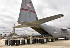 Airmen of the 143d Airlift Wing complete the offload of a detached aircraft wing April 15, 2017, from the back of a C-130J Super Hercules using the Combat Offload Method B technique. Airmen of 176th Wing are developing a Logistics Readiness Device cart that will replace Method B with a foldable platform that can fit on two pallet positions. (Rhode Island Air National Guard photo by Senior Master Sgt. Janeen Miller)

