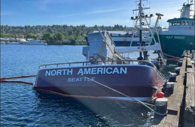 The Coast Guard, Washington Department of Ecology and other agencies respond to the crabbing vessel North American after it sank at a pier in Seattle. (U.S. Coast Guard Photo Courtesy of Coast Guard Sector Puget Sound)